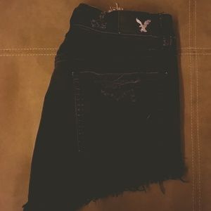 Black distressed jean shorts